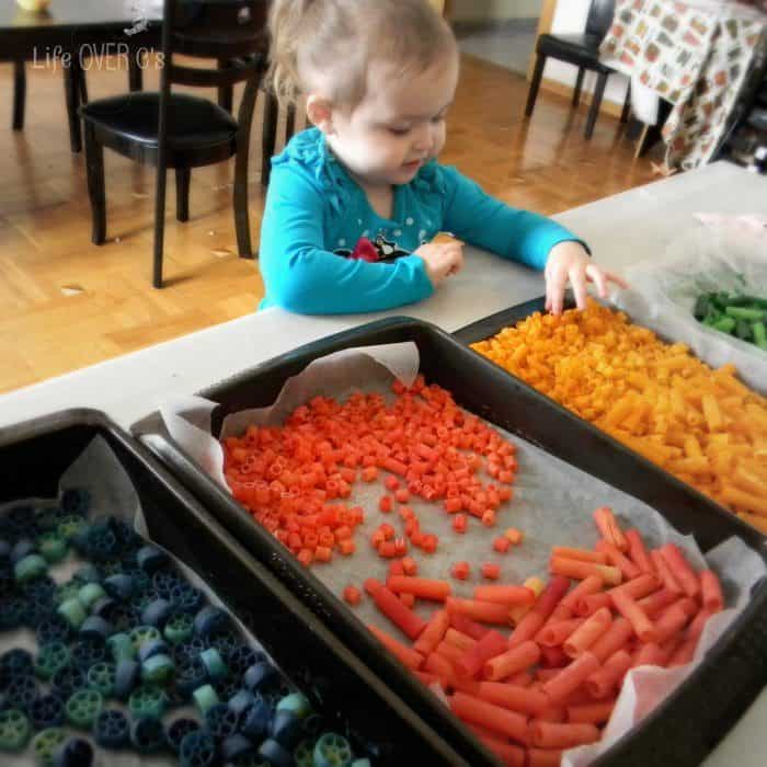 dyeing pasta with vinegar is an easy way to add color to your pasta crafts and activities!