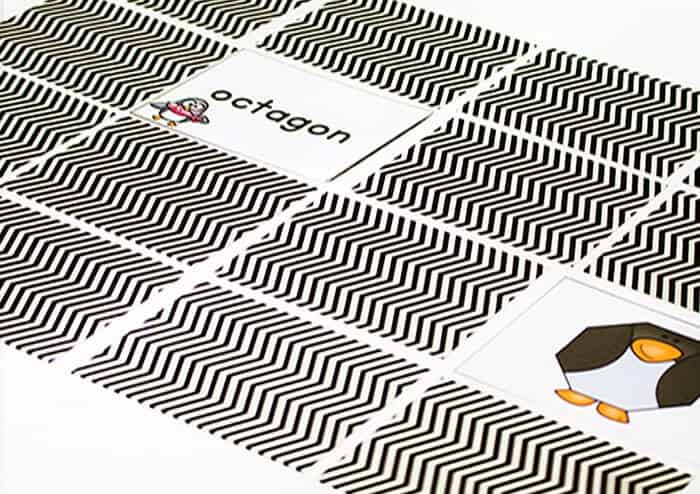 this free printable penguin shape matching game is a great way to learn about 2-dimensional shapes! these silly penguins are all shaped like polygons and the kids love playing with them!