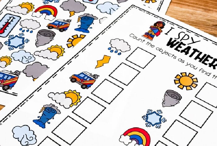 horizontal image of weather i spy game for preschoolers with recording sheet. text on game says i spy weather. count the objects as you find them.