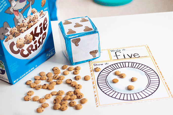 build number recognition with this chocolate chip roll and count dice game for preschoolers.