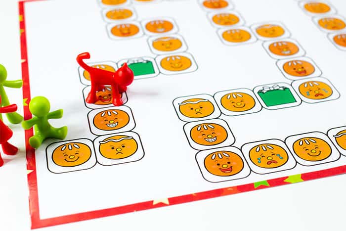gingerbread themed emotions board game. printable game board with emotion cards for learning about emotions with preschoolers.