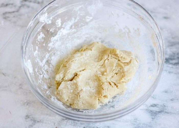 makings of honey slime in a mixing bowl.