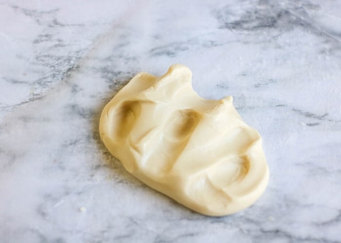 honey based slime on a marble background.