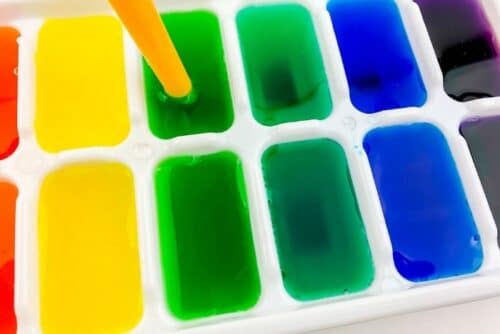 Rainbow Snow and Ice Cube Sensory Bin for Winter