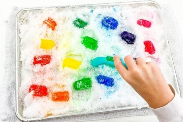 Rainbow Snow and Ice Cube Sensory Bin for Winter