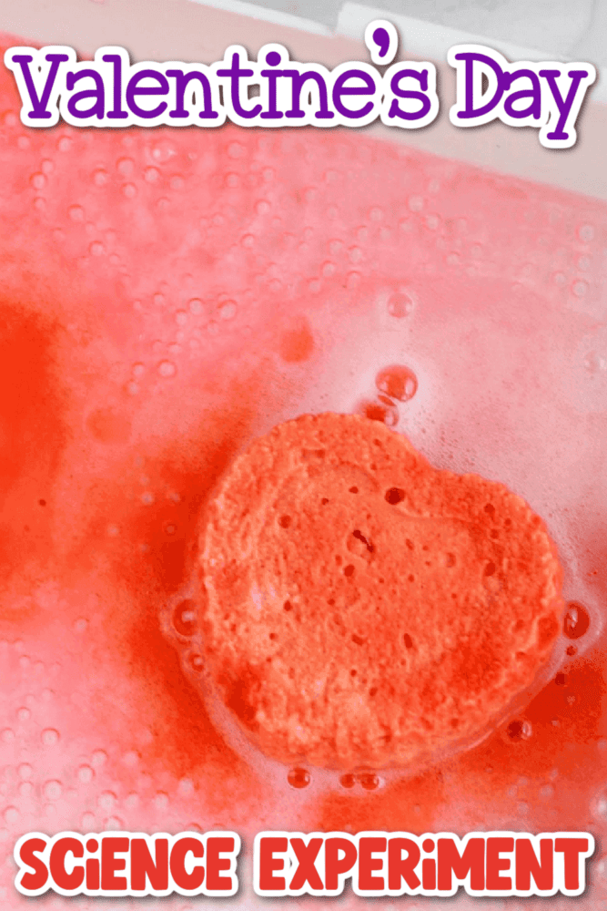 vertical image text overlay [valentine's day science experiment] with image of a red baking soda heart fizzing with vinegar