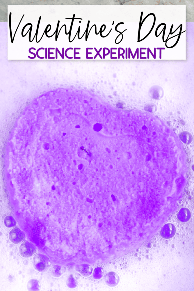 vertical image of purple heart shaped vinegar and baking soda science experiment for kids