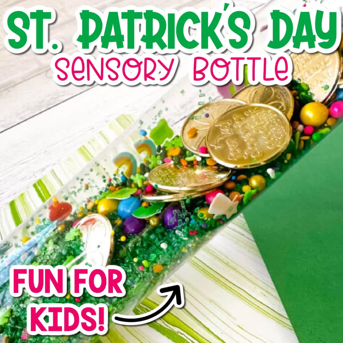 st. patrick's day themed sensory bottle filled with green sprinkles, rainbow sprinkles and gold coins