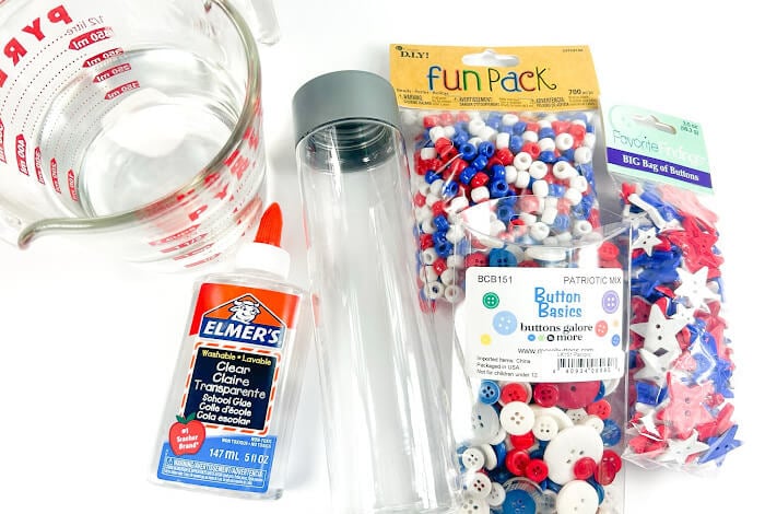 overhead shot of the supplies for making a july 4th sensory bottle.