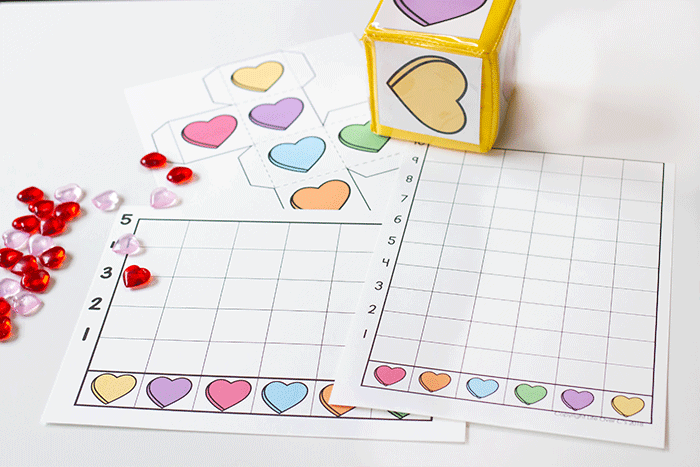 Valentine Math Pack TW 3 valentine's day graphing activity with two graph options, differentiated instruction cube with colored heart inserts