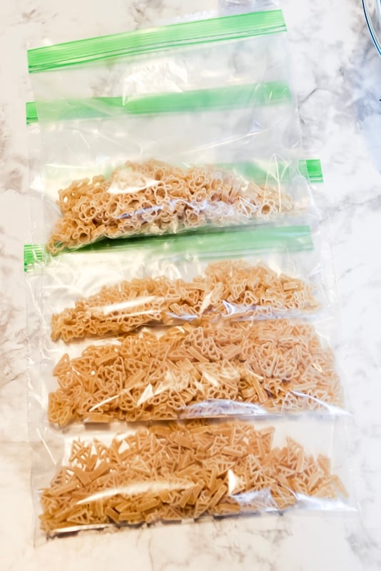 photo showing multiple ziploc bags with uncooked bunny pasta inside.