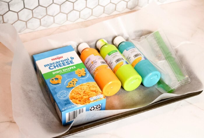 supplies to paint pasta for a dinosaur sensory bin.