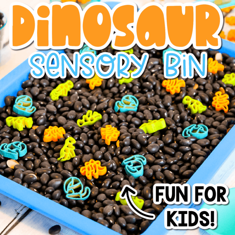 close up image of painted dinosaur pasta and black beans in a dinosaur sensory bin.