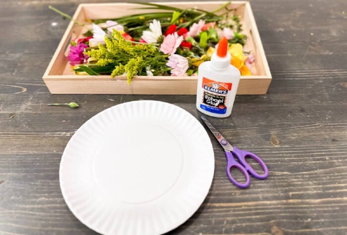 overhead photo of the supplies for making the wreath craft.