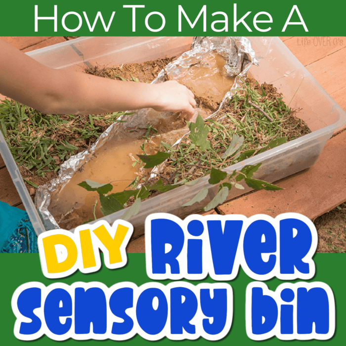 a child playing in a sensory bin made with mud, leaves, and dirt to look like a river habitat.