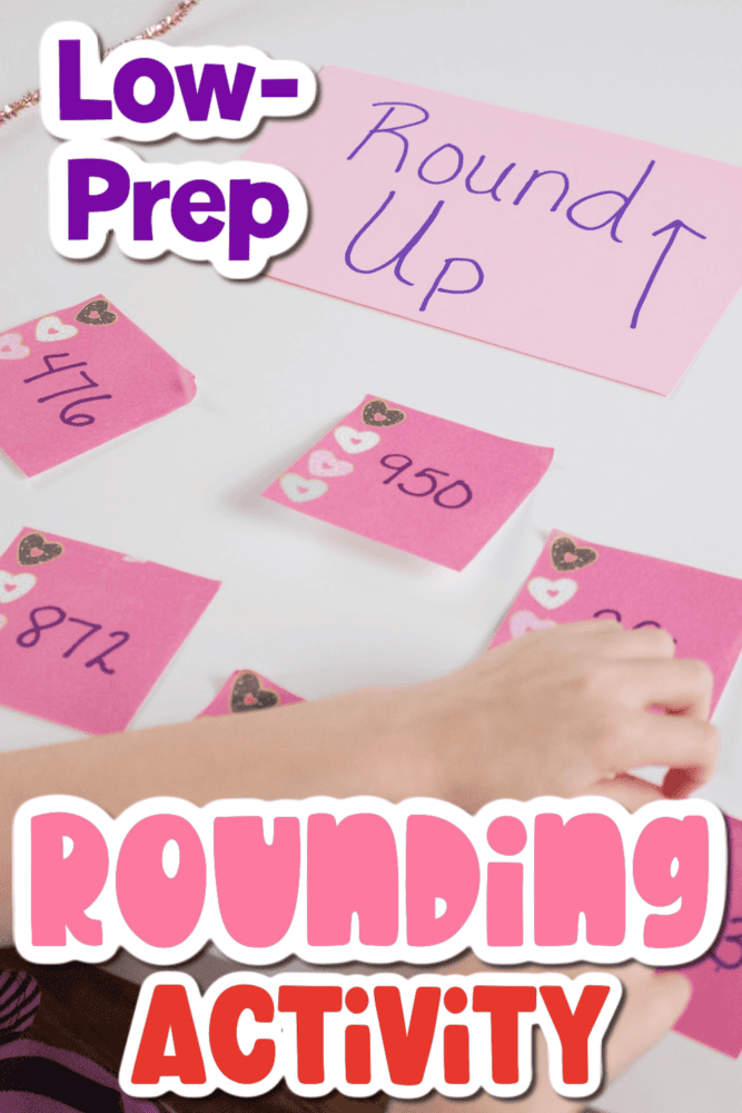 child completing a rounding activity with sticky notes.