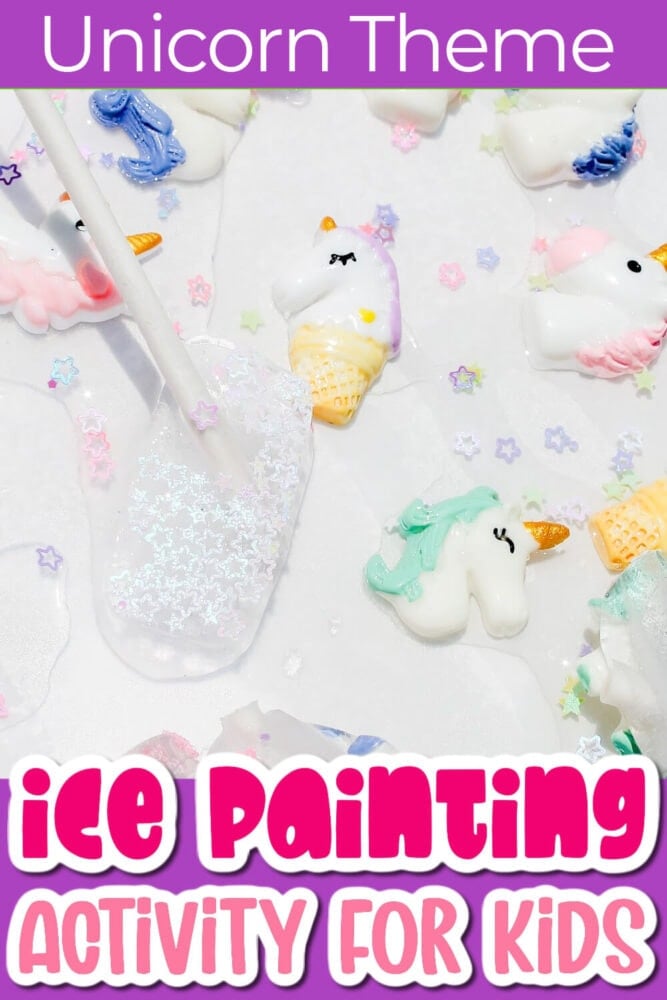 a glittery ice cube on a stick next to small unicorn charms.