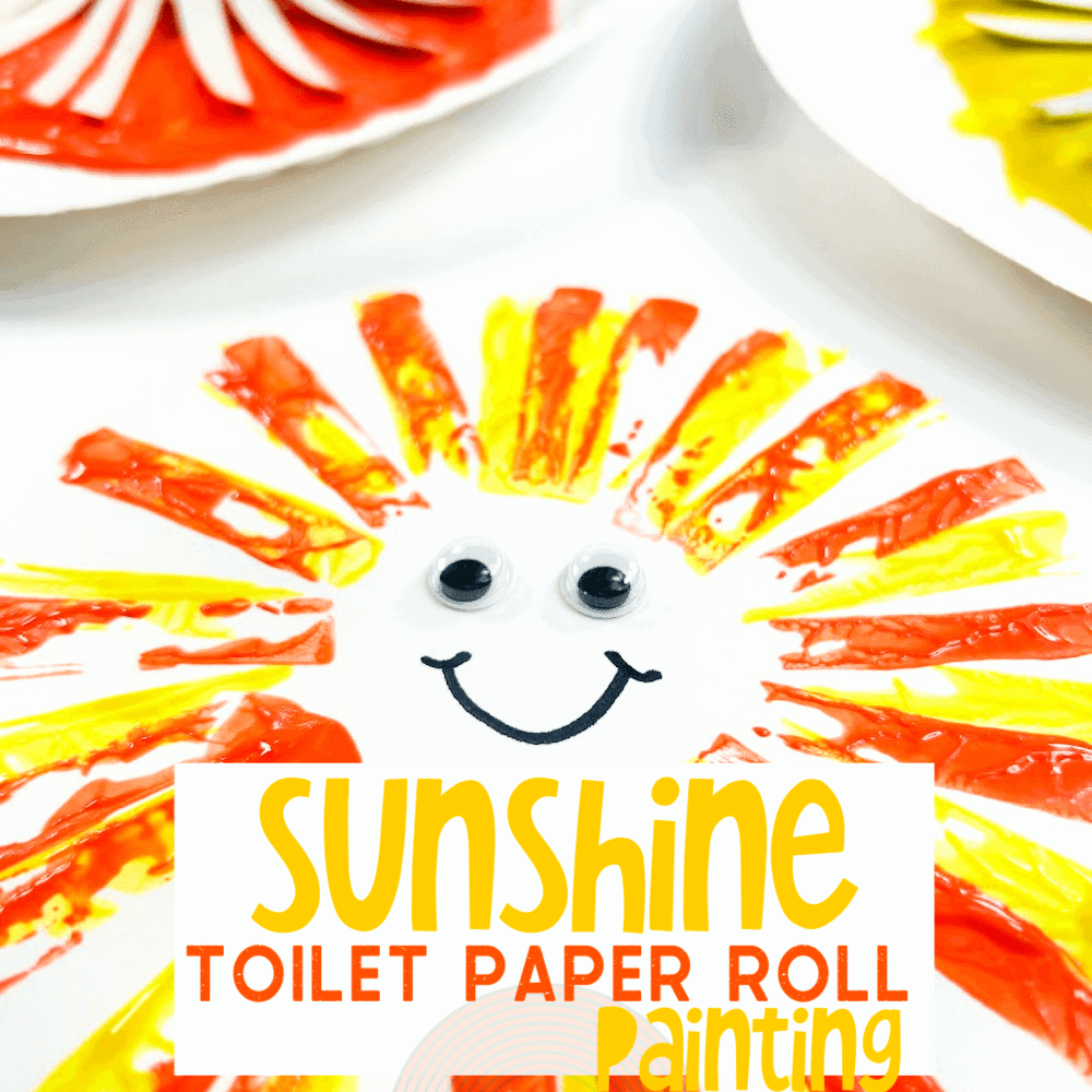 overhead image of a sun painting made from paint and toilet paper rolls.