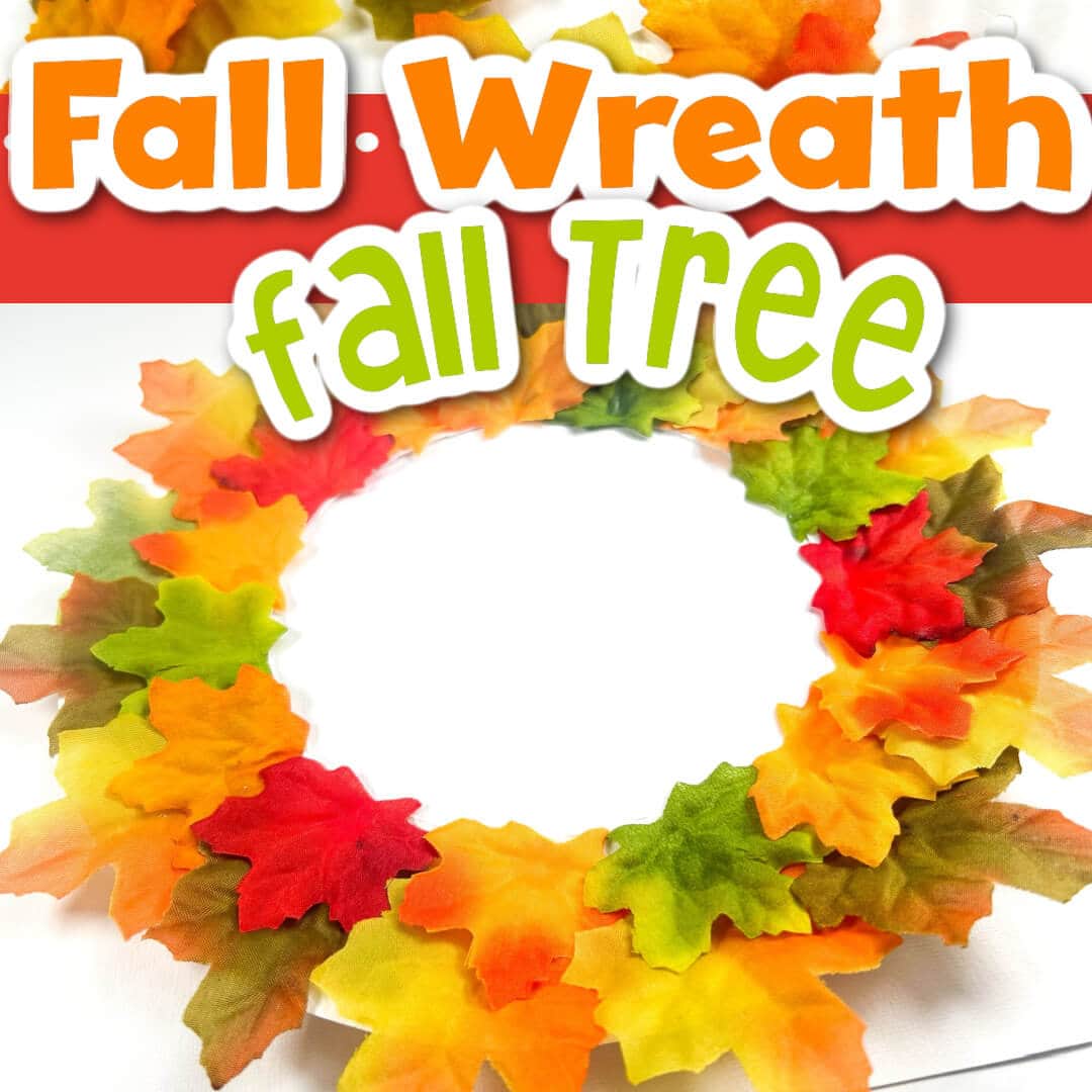 a fall wreath made out of a paper plate and colorful faux leaves.