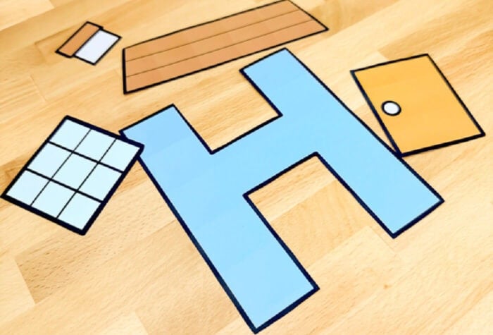 all the pieces of a letter h craft are cut out and ready to assemble.