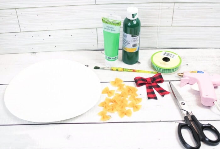 photo of materials for a paper plate christmas wreath