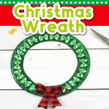 square photo of paper plate wreath painted green with farfalle pasta painted green with a red and black checked bow on a white wood background with text overlay [christmas wreath]