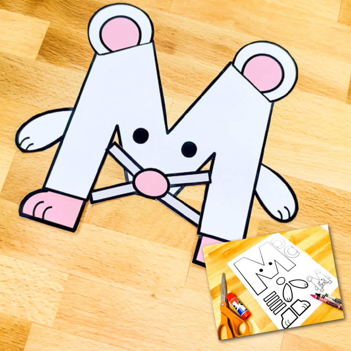 2 photos of uppercase letter m craft m is for mouse 1 photo shows free printable black and white outline letter m craft and larger photo in background shows the letter m craft fully assembled