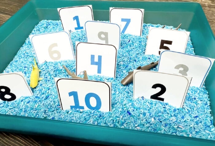 shark play dough number mat with number word tracing and teeth counting, ideal for preschool math centers and summer themes