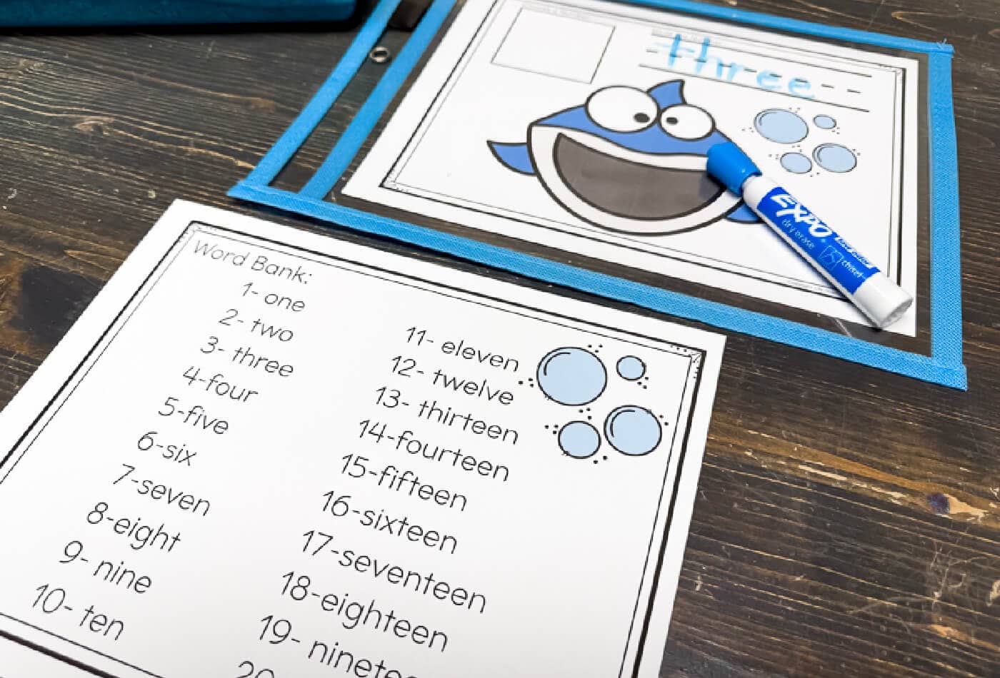 shark play dough number mat with number word tracing and teeth counting, ideal for preschool math centers and summer themes