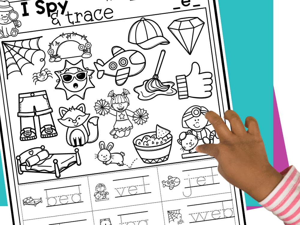 child pointing to pictures on an i spy and trace cvc words worksheet with short vowel sounds and simple three letter words. this hands-on phonics printable strengthens visual discrimination, cvc word identification, literacy centers, and kindergarten reading skills.